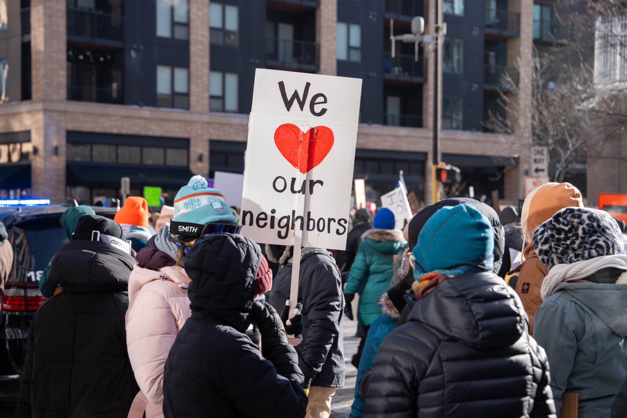 A group of community members speak out in support of their immigrant neighbors in Minnesota. Photo credit: Molly Miles