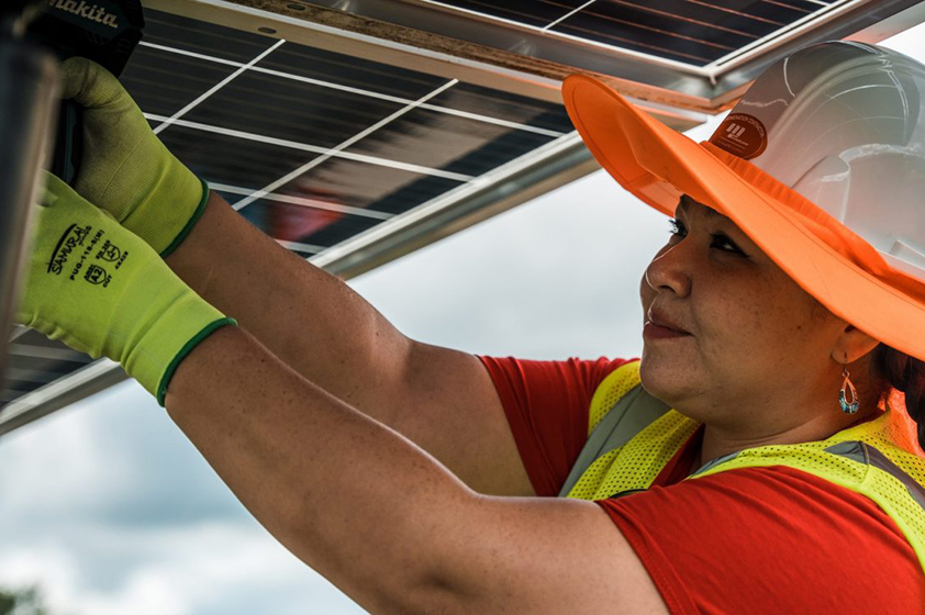 White Earth Tribal Community College solar trainee installs panels with local utility and contractor in Minnesota. Photo credit: Clean Energy Economy Minnesota