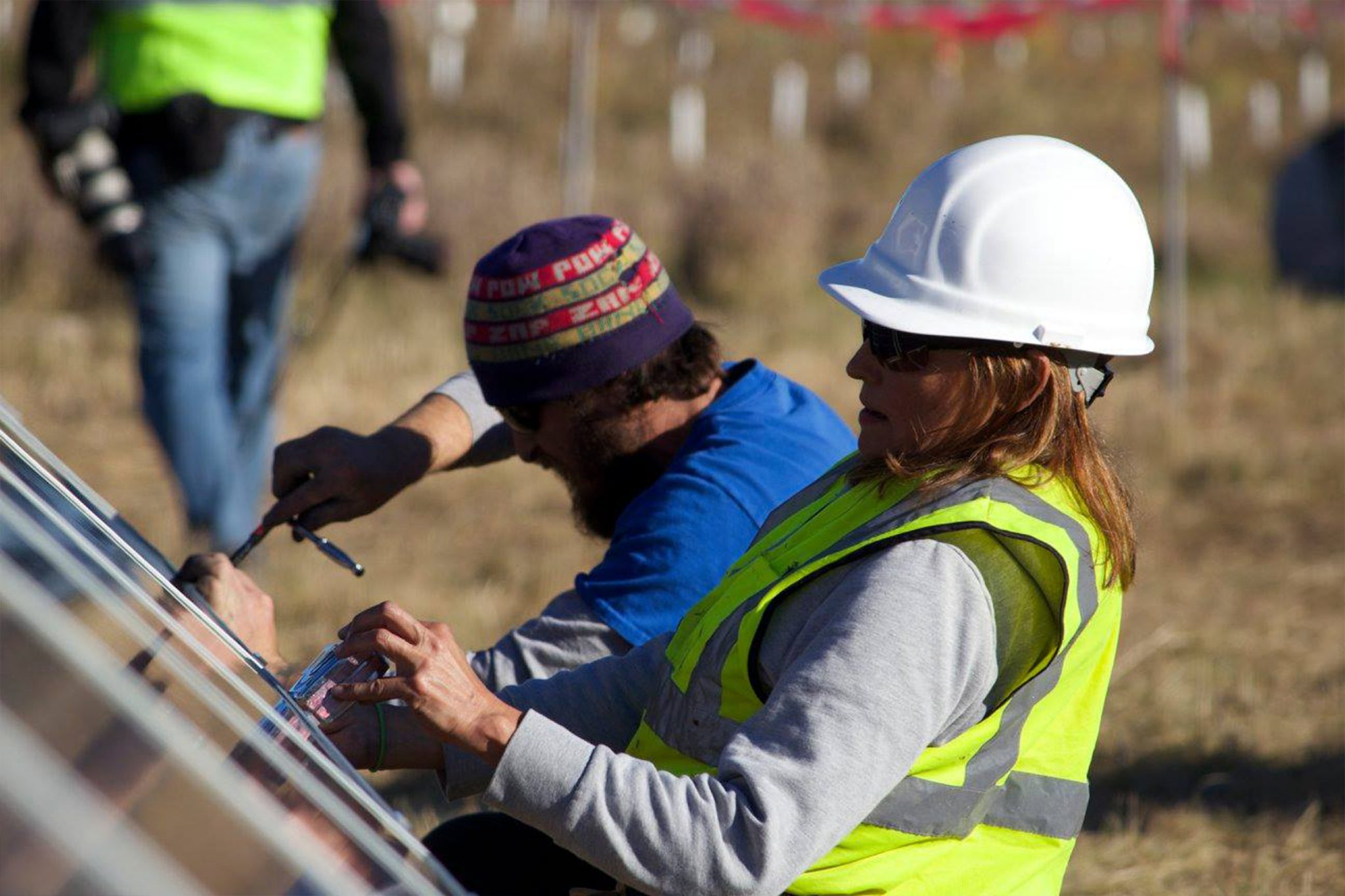 two people doing construction work