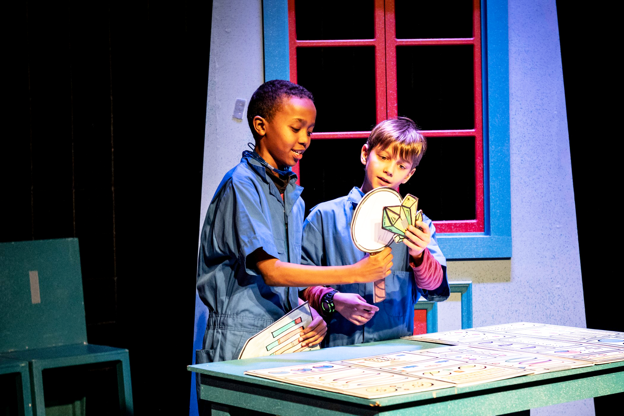Two youth performers on a stage