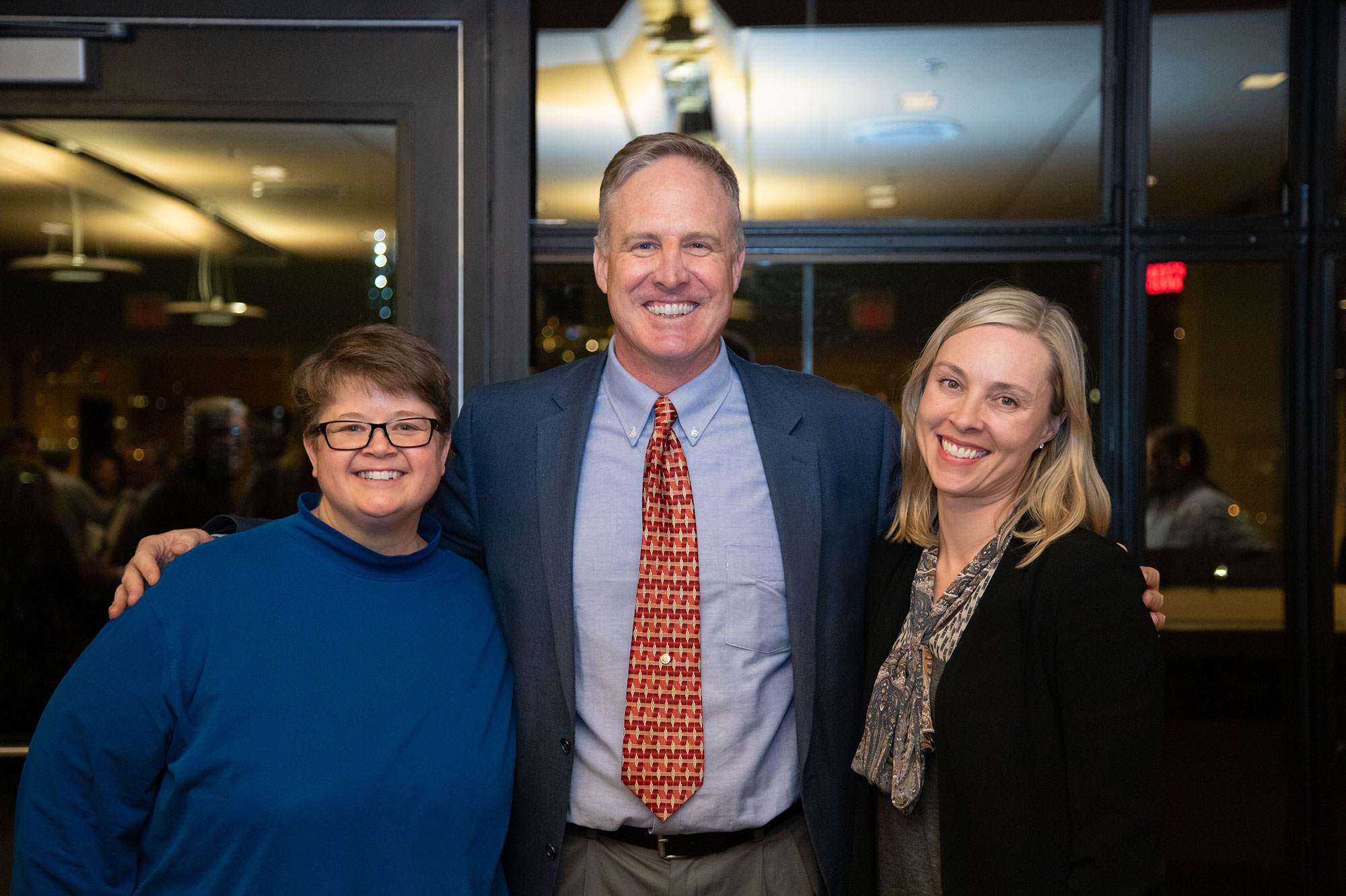 Sarah “Sam” Marquardt, Mark Muller, and Julia Olmstead pose for a photo at the Mississippi River program celebration. Photo Credit: Molly Miles