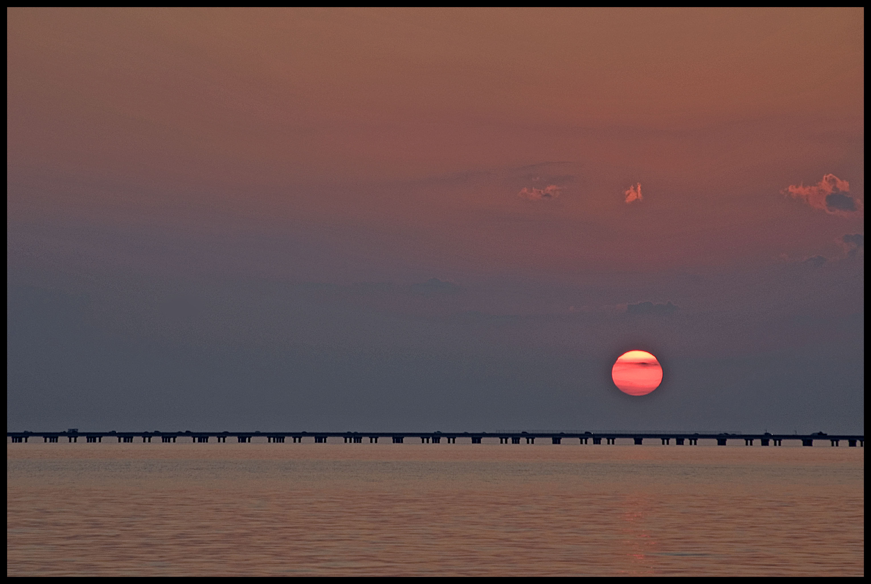 Sunset over Lake Pontchartrain in Louisiana. Photo by Peter Clark.